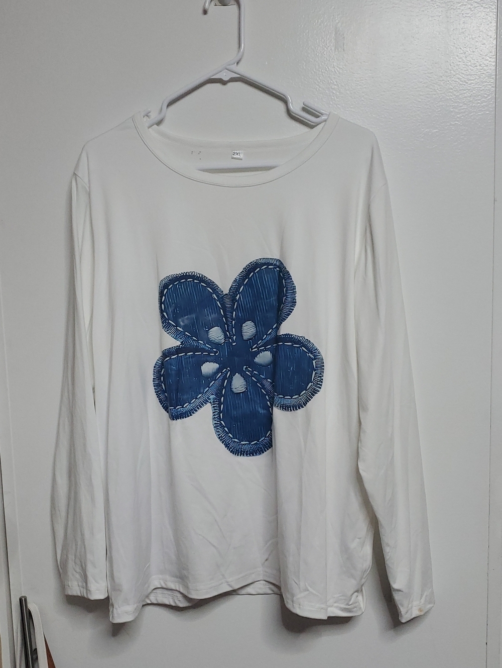 Buttery Soft White Long Sleeve Top with Blue Floral Appliqué